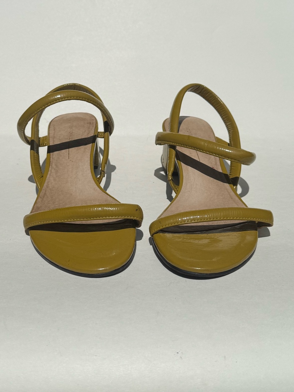 Intentionally Blank Olive Patent Leather Block Heel Slingback.